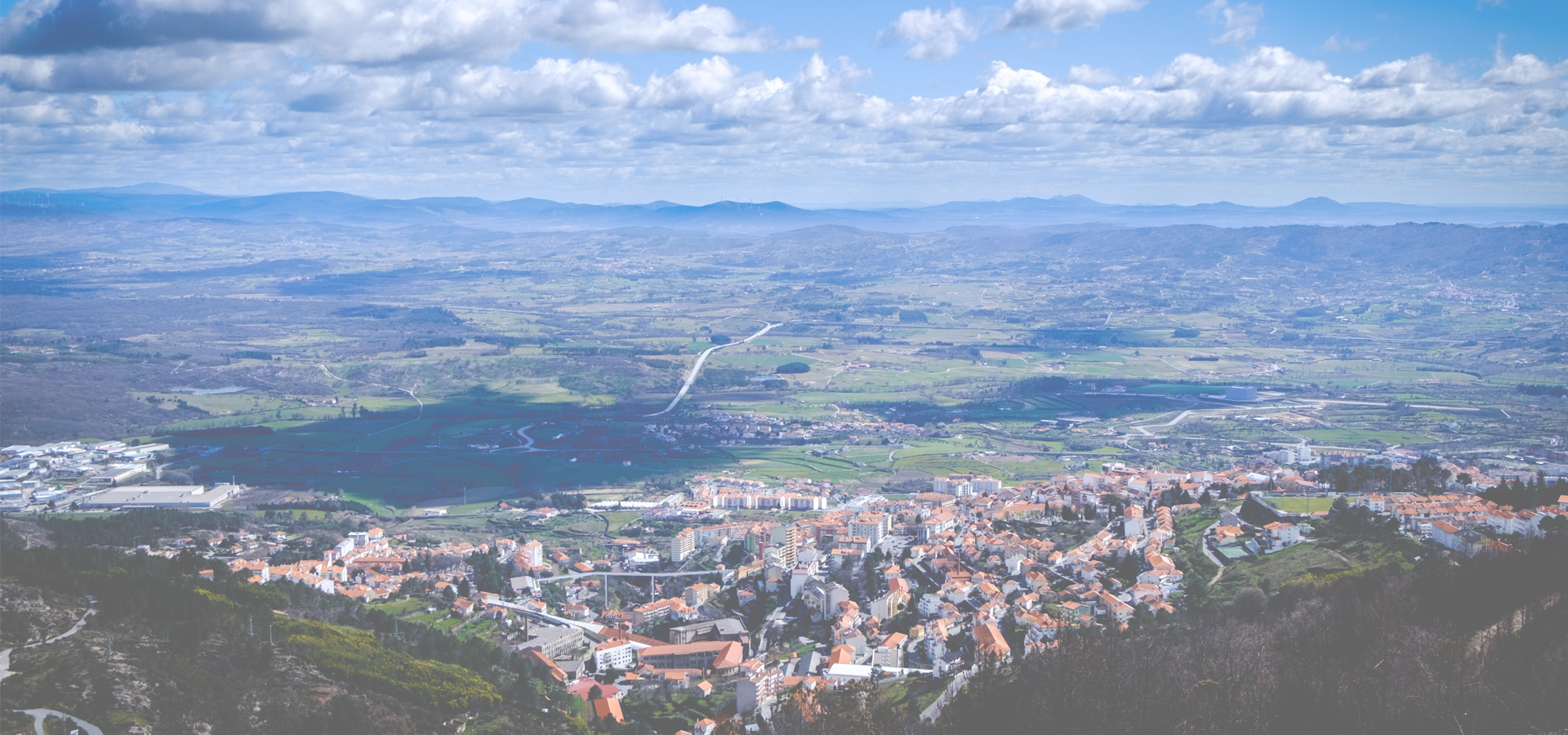 View of small Portuguese town Covilha and district Castelo Branco, from the Serra fa Estrella mountains.