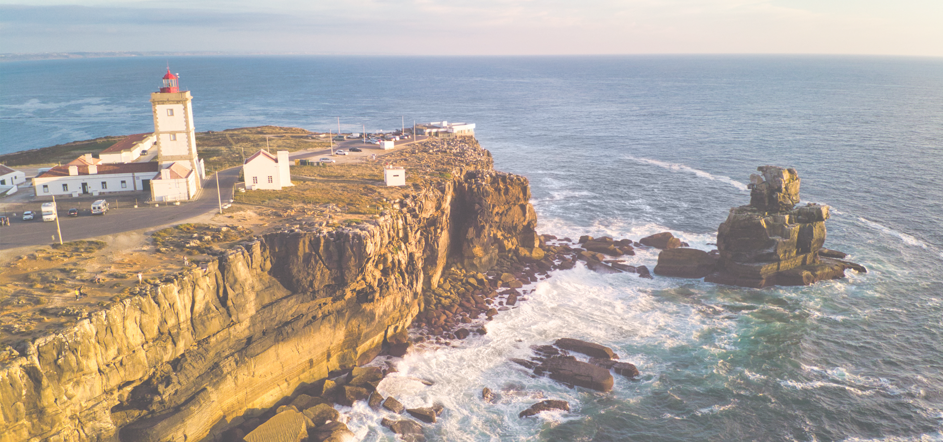 View Of Lighthouse And Sea In Peniche Portugal At Sunset